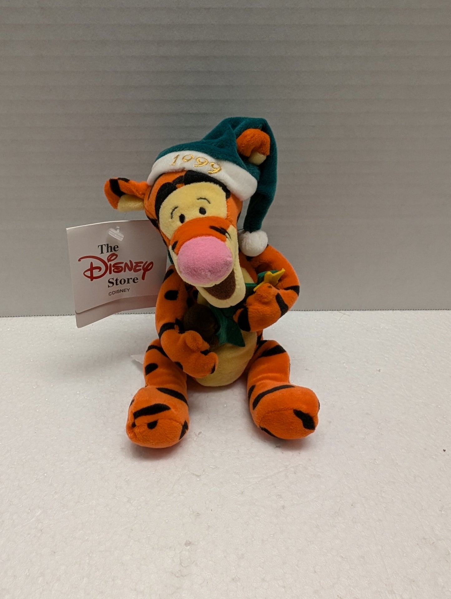 Disney Bean Bag Tigger with Green Santa Hat and Green Scarf. image 0