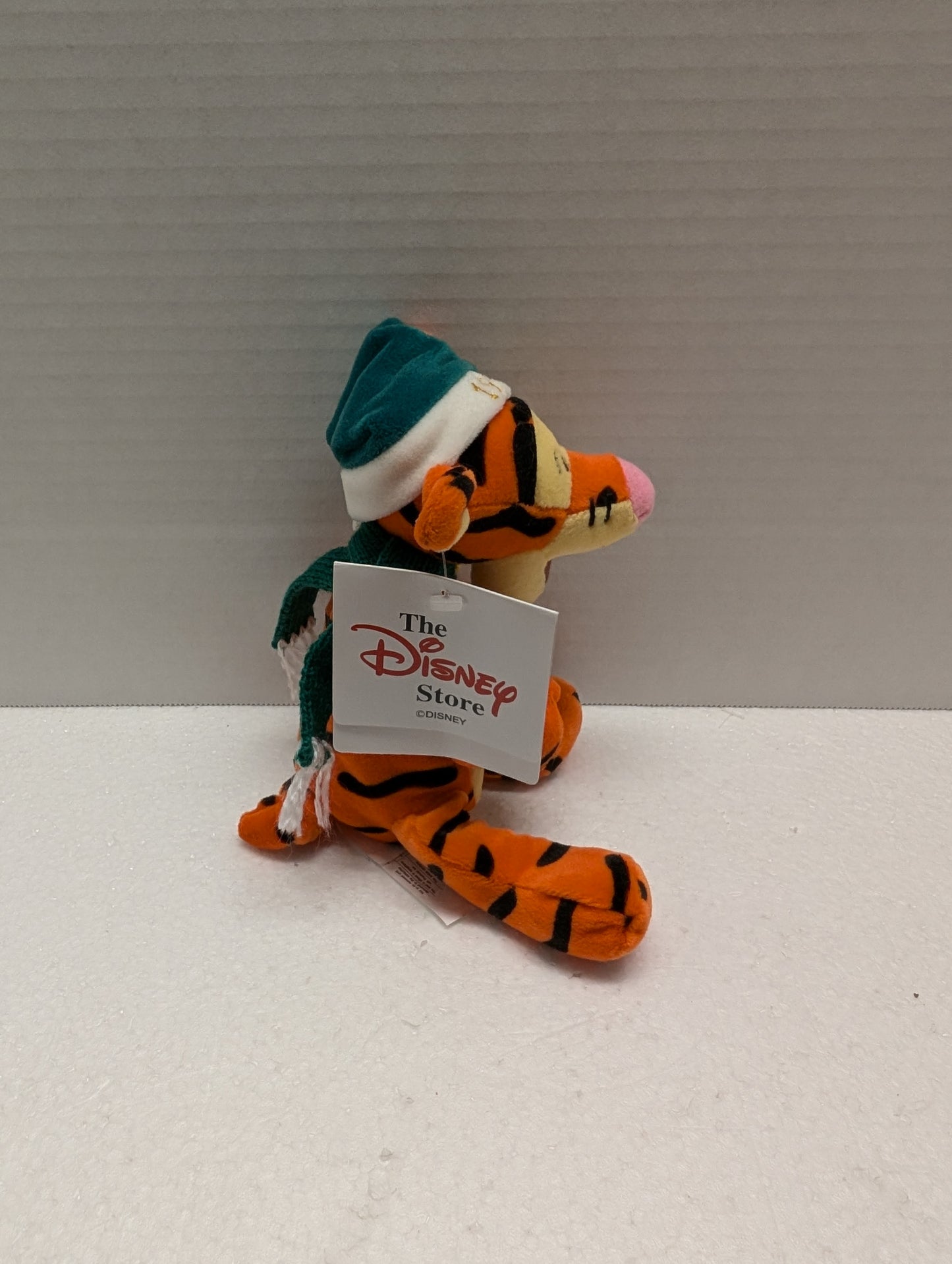 Disney Bean Bag Tigger with Green Santa Hat and Green Scarf. image 1